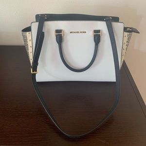 Michael Kors snake print satchel.